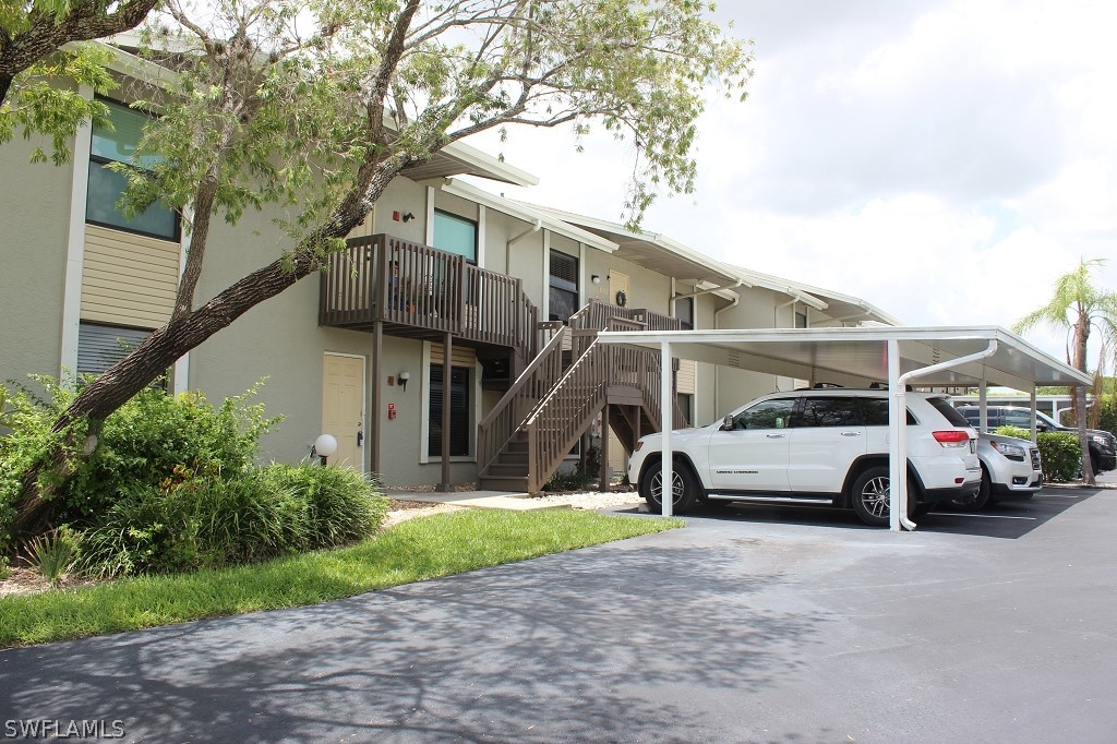 a view of a car in front of house