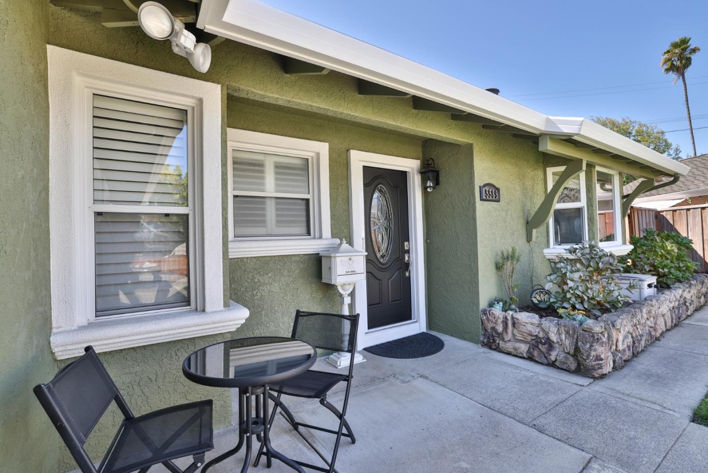 a view of a porch with seating space