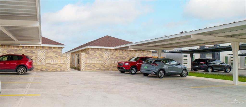 Main entrance with covered parking