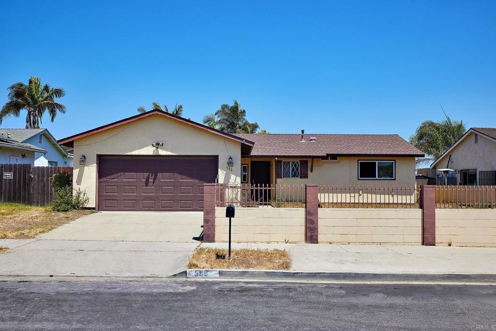 front view of a house with a street