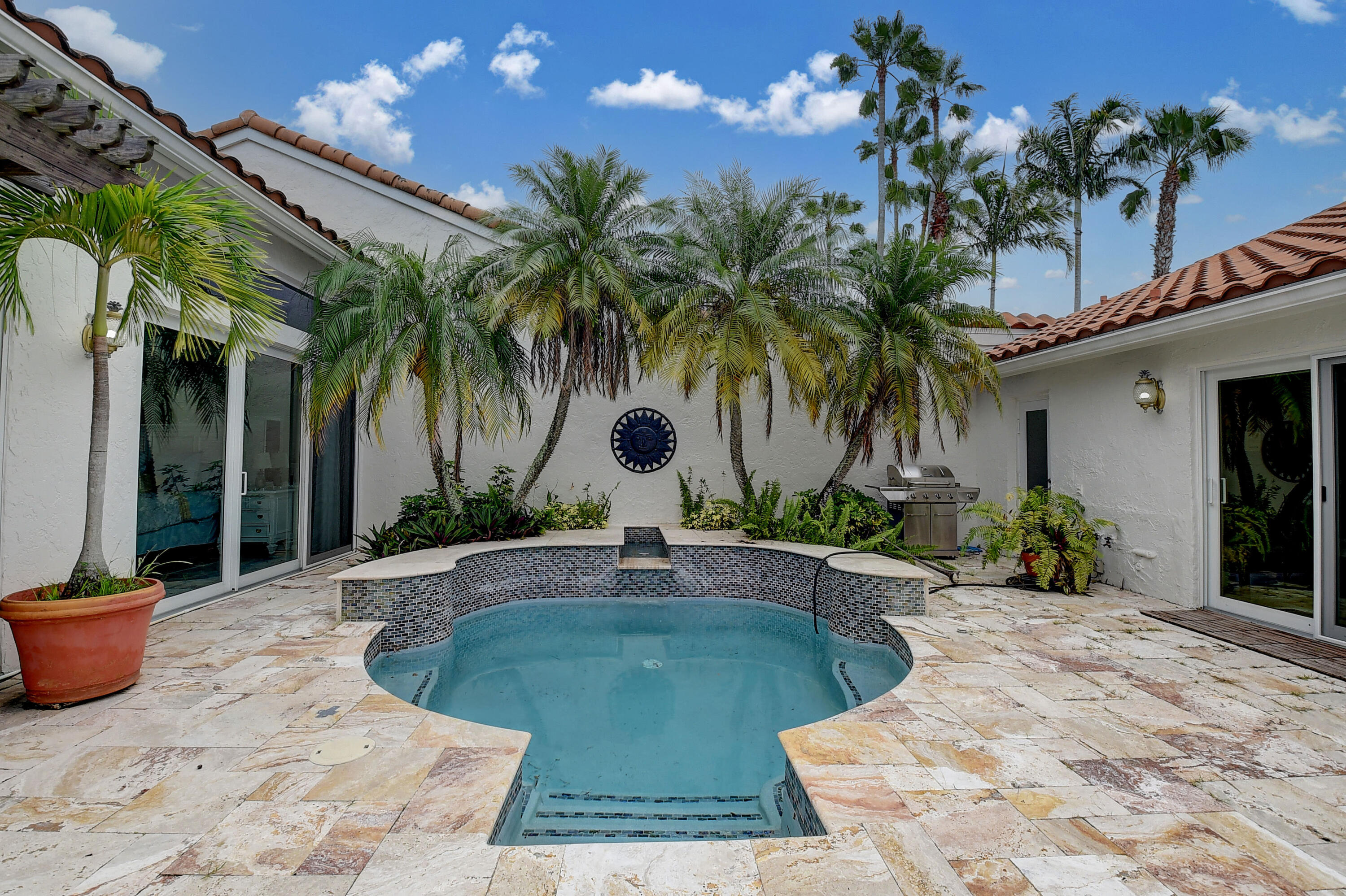 front view of a house with a patio