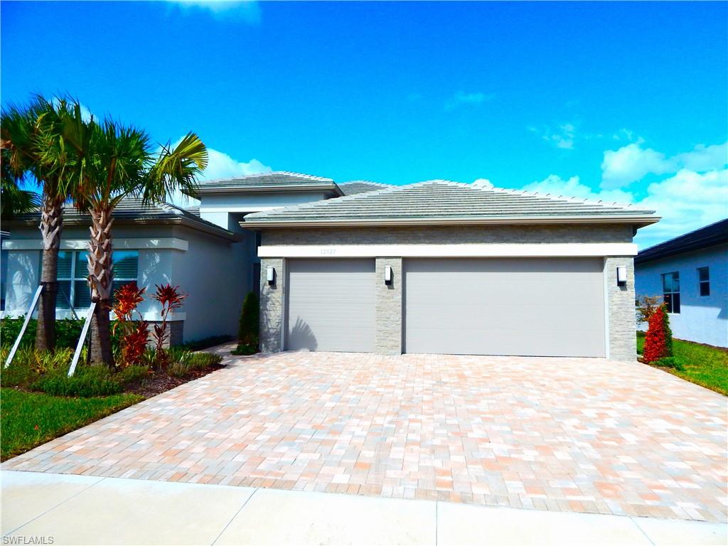 a view of a house with a garage