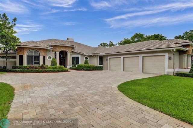 $1,650,000 | 7520 Northwest 50th Court | Whispering Woods