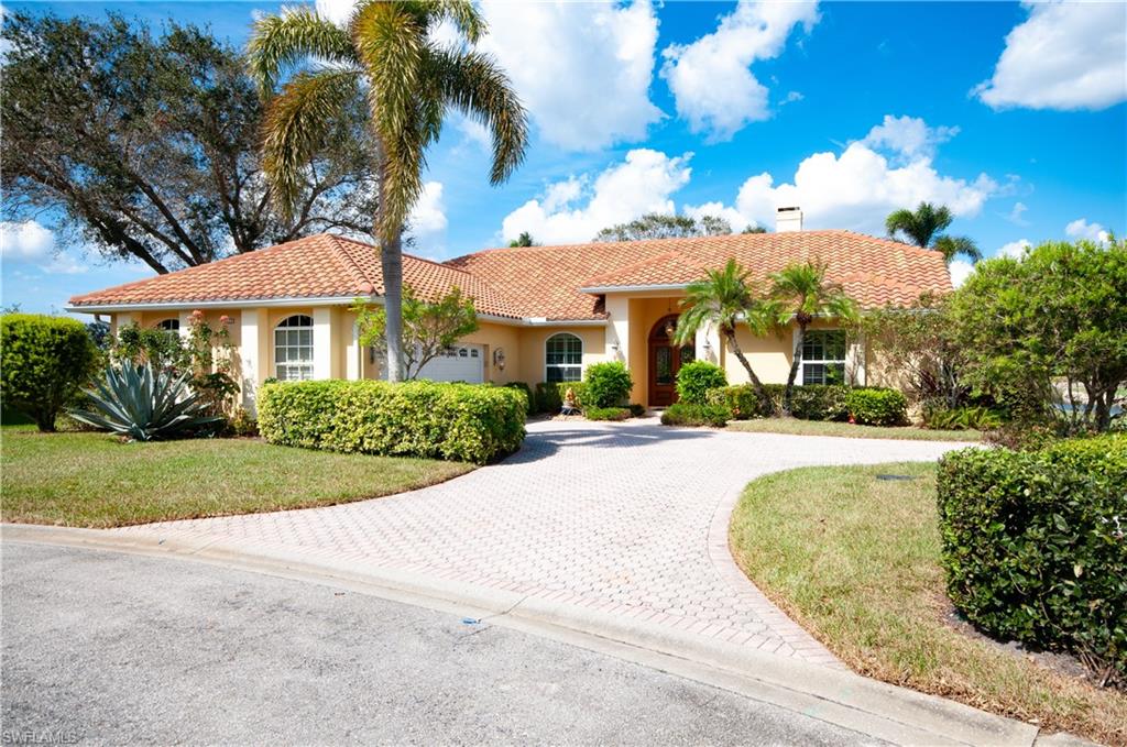 a view of multiple house with a yard