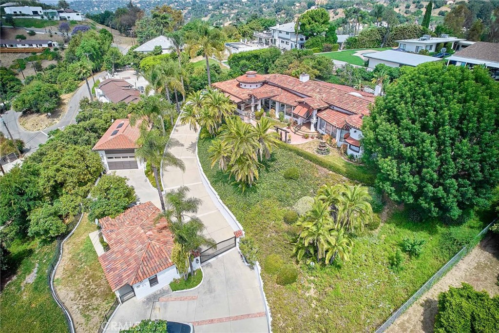 an aerial view of a house with a garden