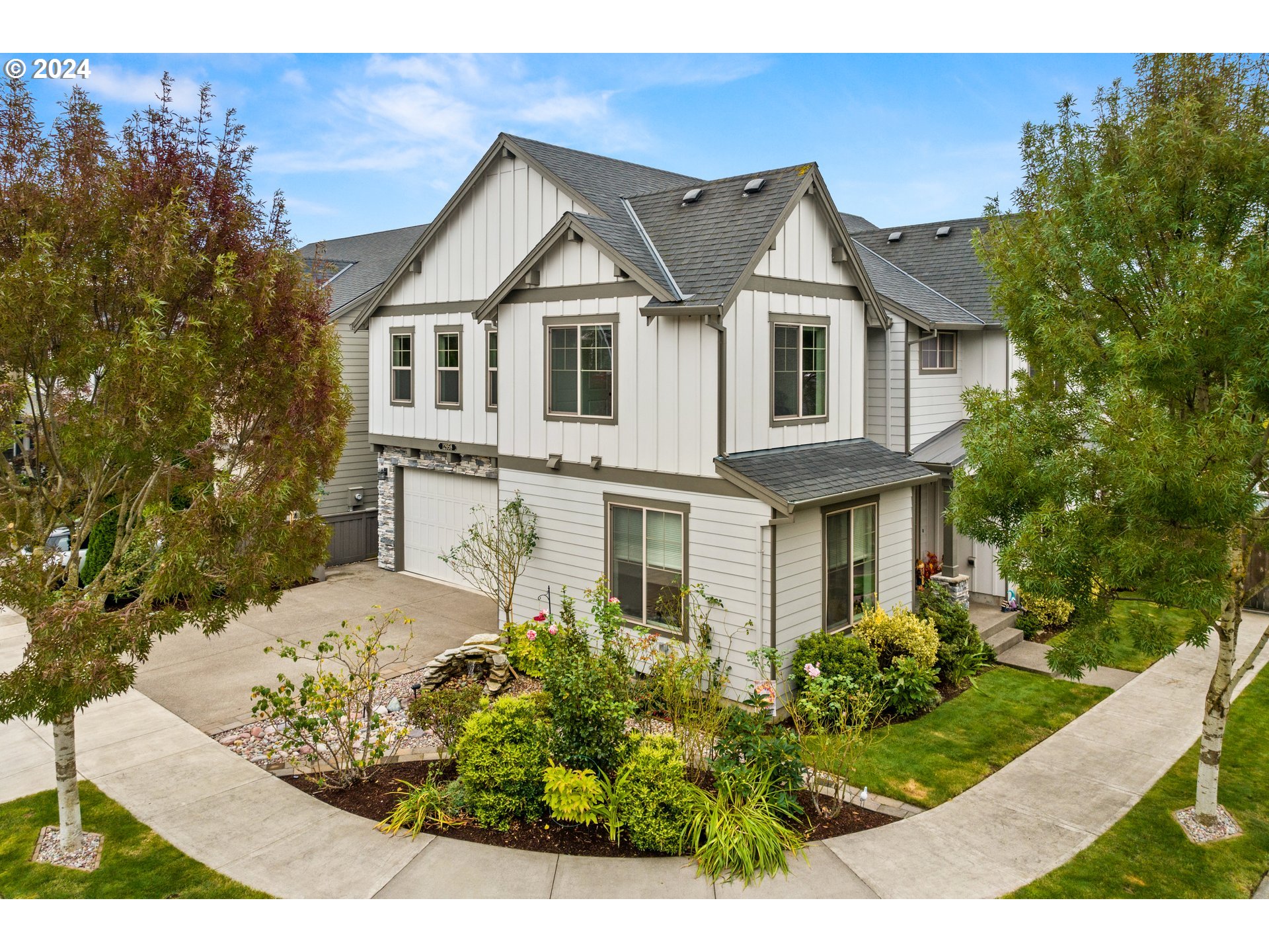 a front view of a house with a yard