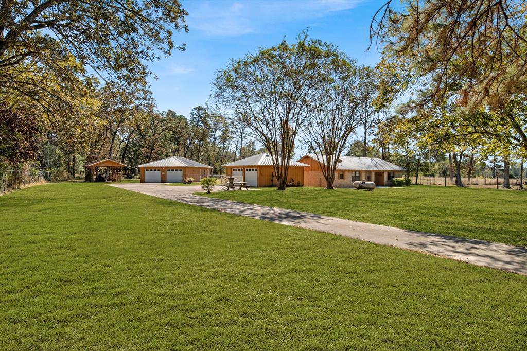 Front of the property and driveway.