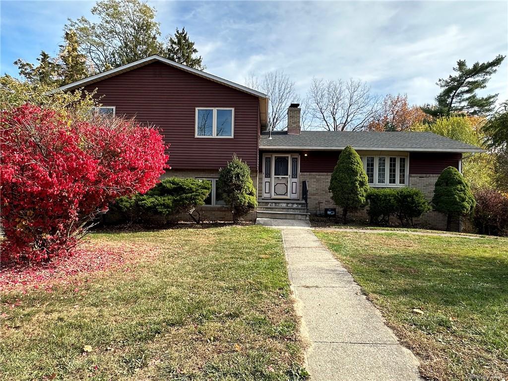 a front view of house with yard