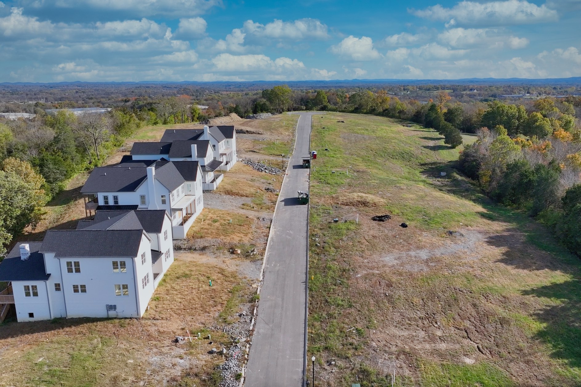 an aerial view of a house with a garden