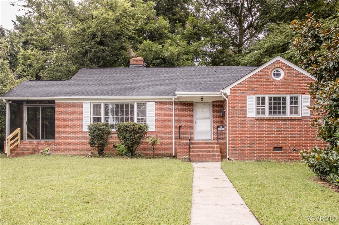 front view of a house with a yard