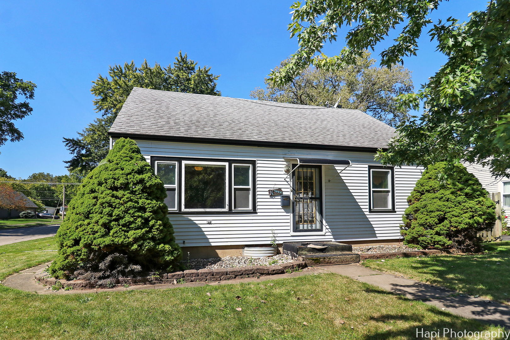 front view of a house with a yard