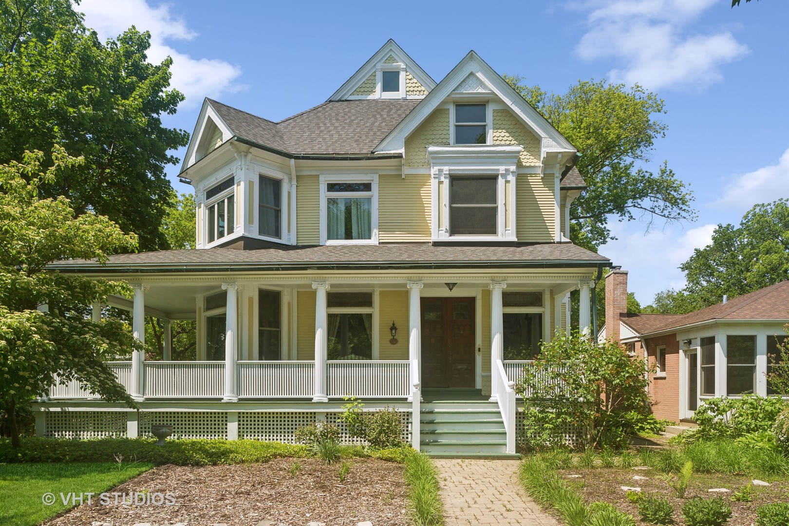 front view of a house with a yard