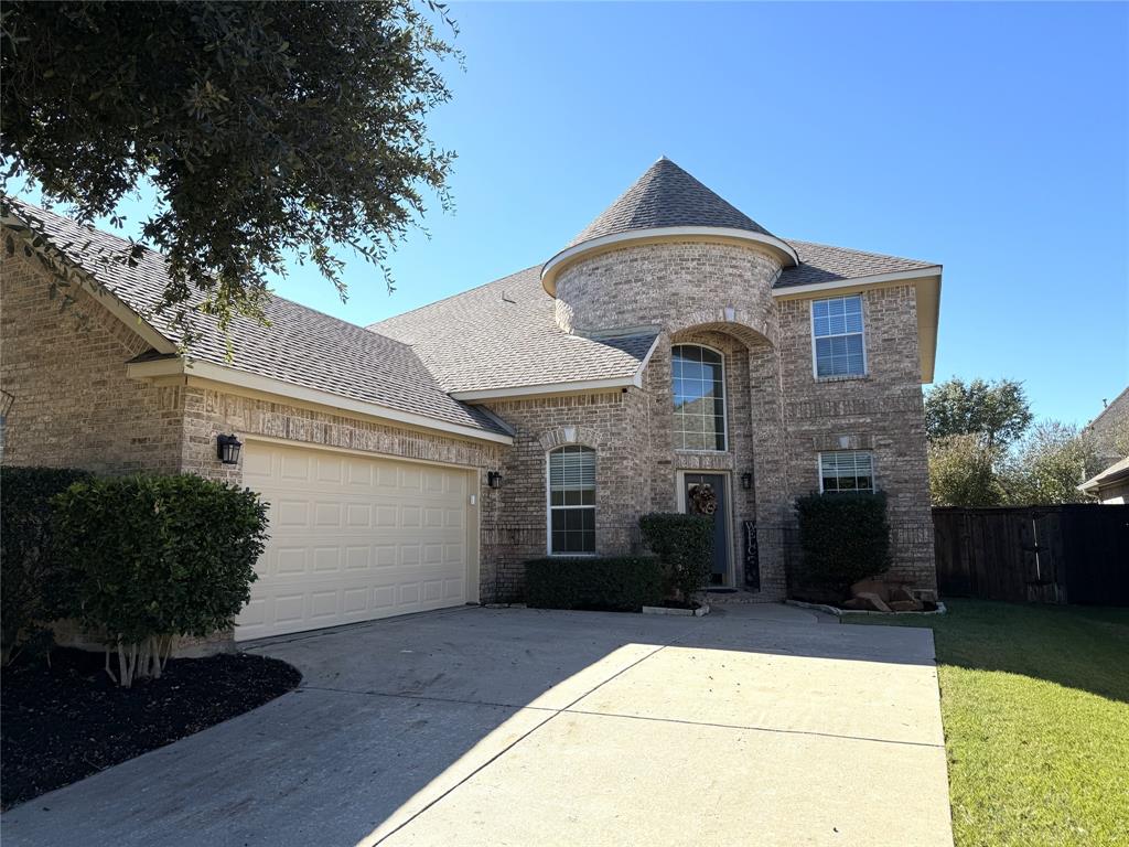 a front view of a house with yard