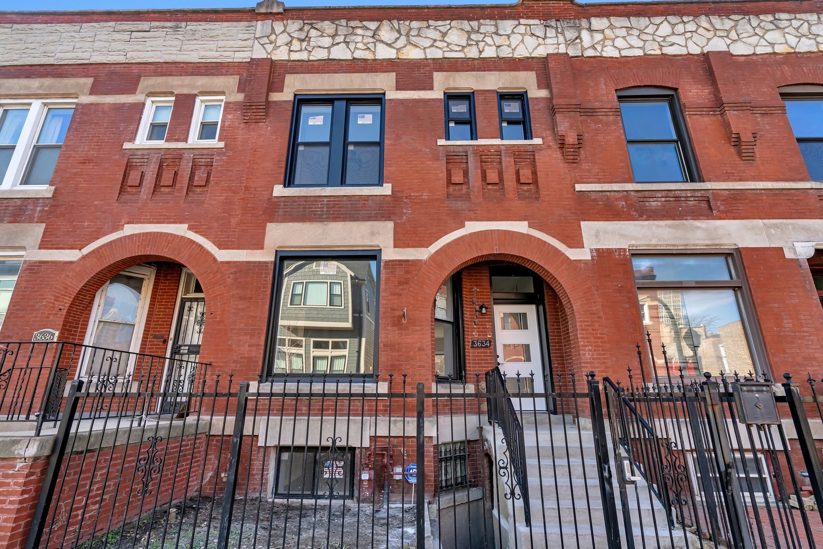 a view of a brick building with a balcony