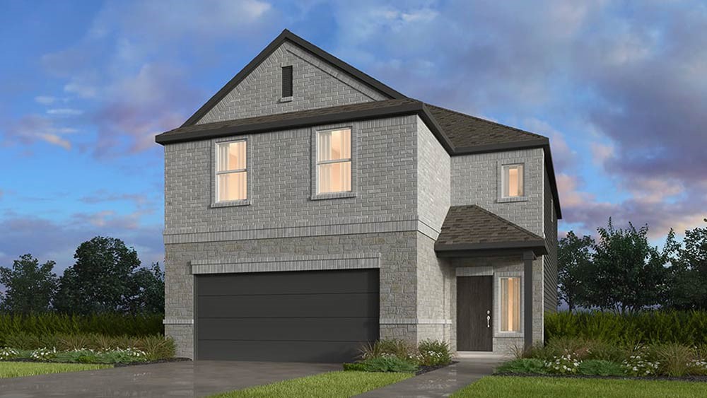 a front view of a house with yard garage and green space