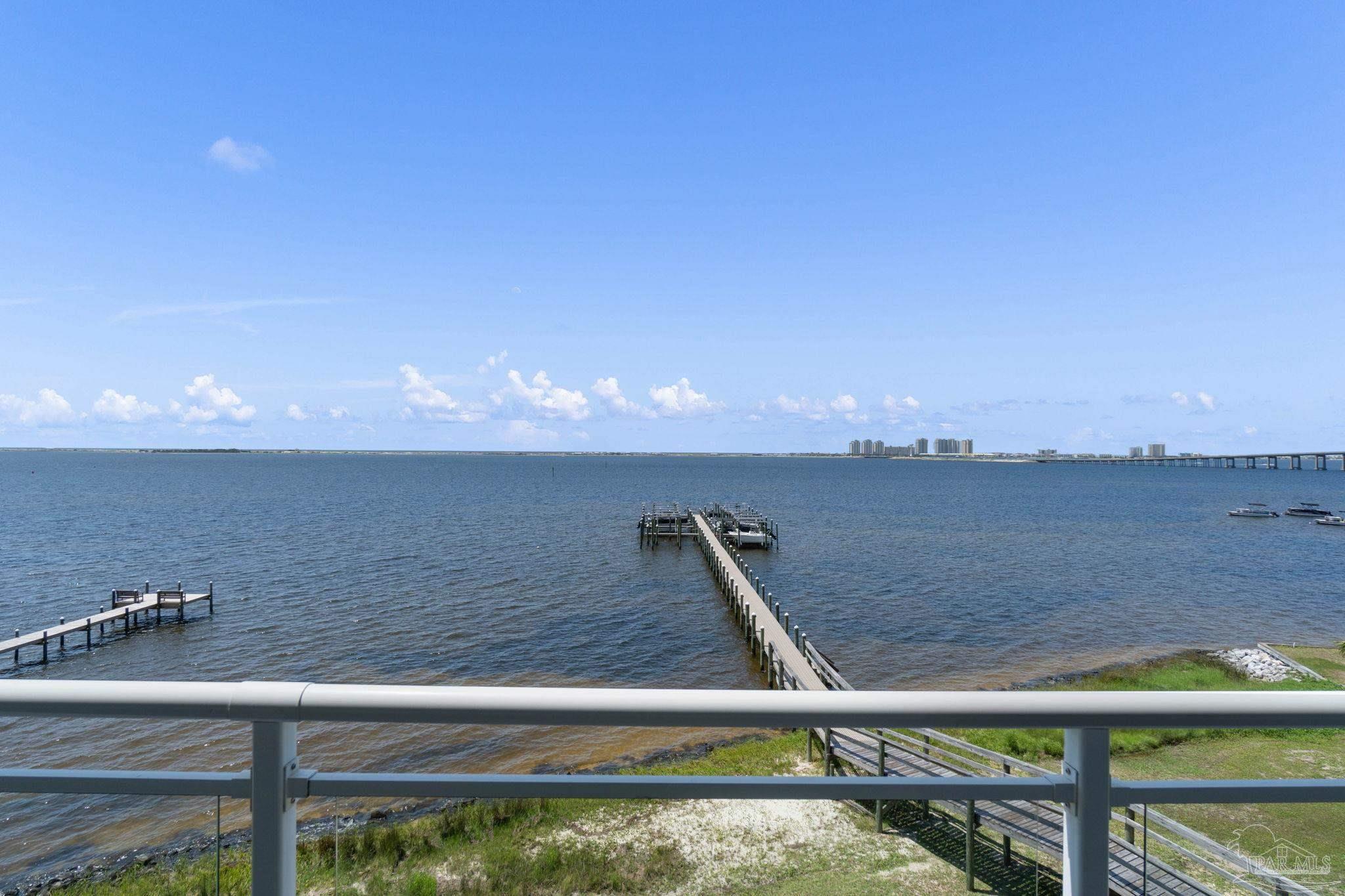 a view of a balcony with an ocean