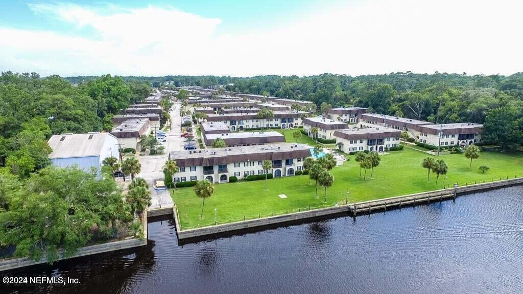 an aerial view of residential house and outdoor space