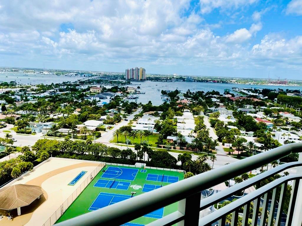 a view of swimming pool from a balcony