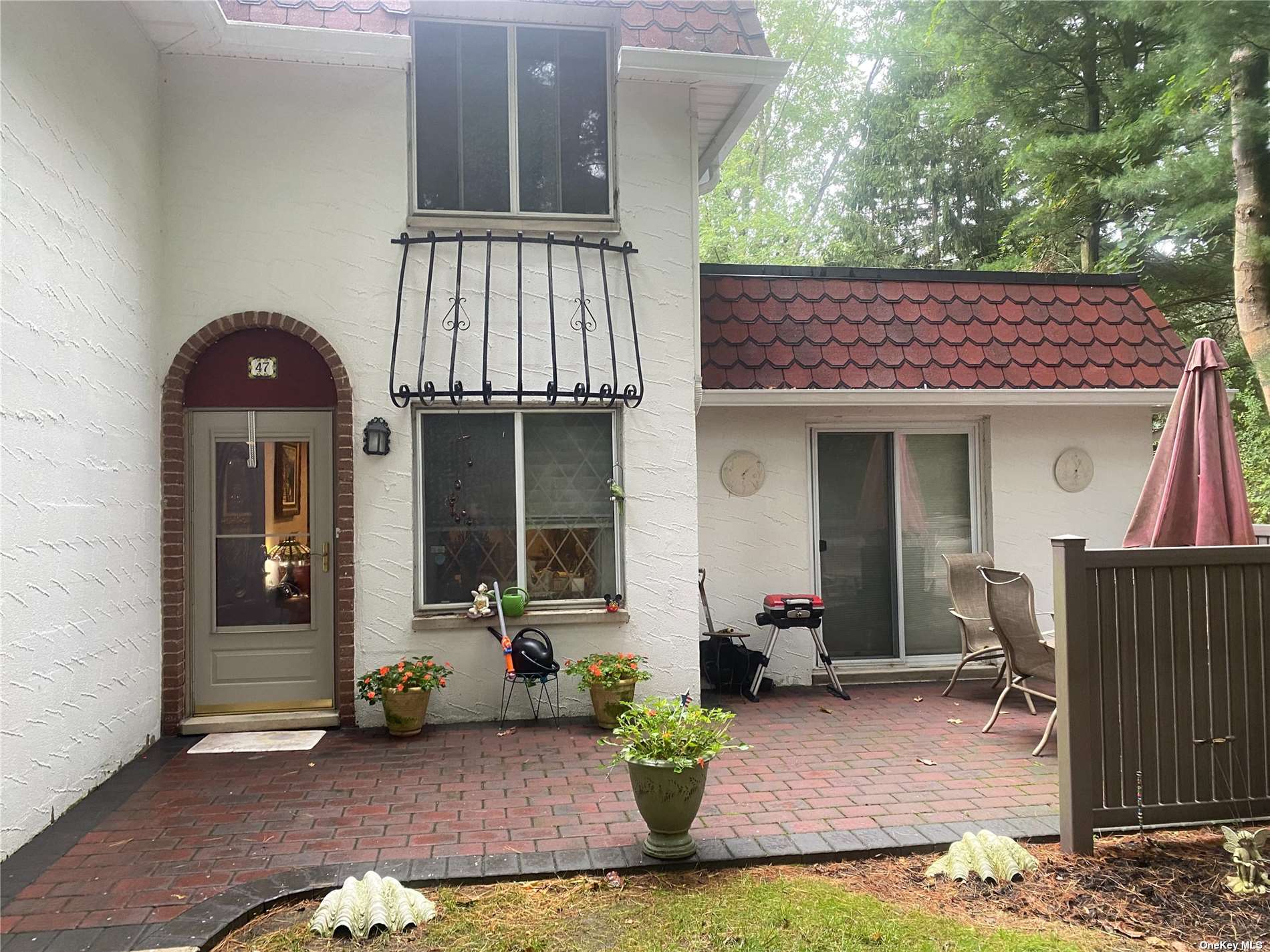 a front view of a house with a porch