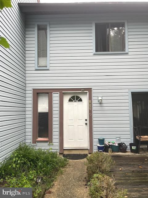 a front view of a house with a garage