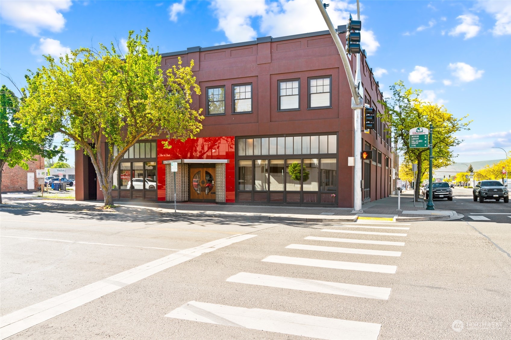 a view of a building with a street