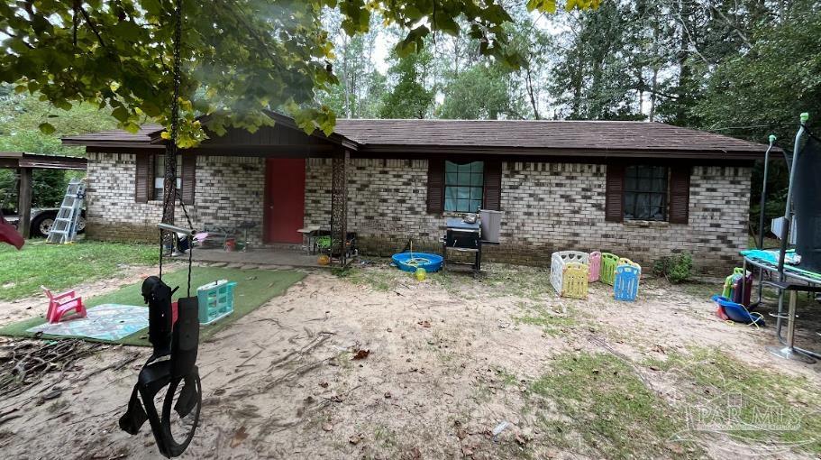 a front view of a house with patio