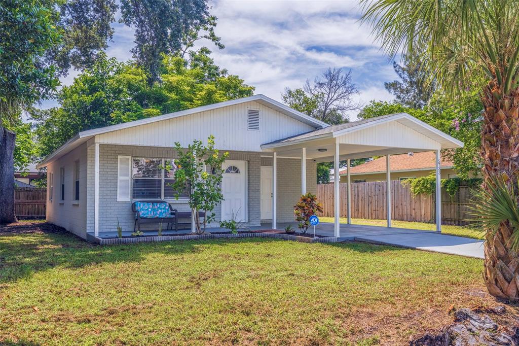 front view of a house with a yard