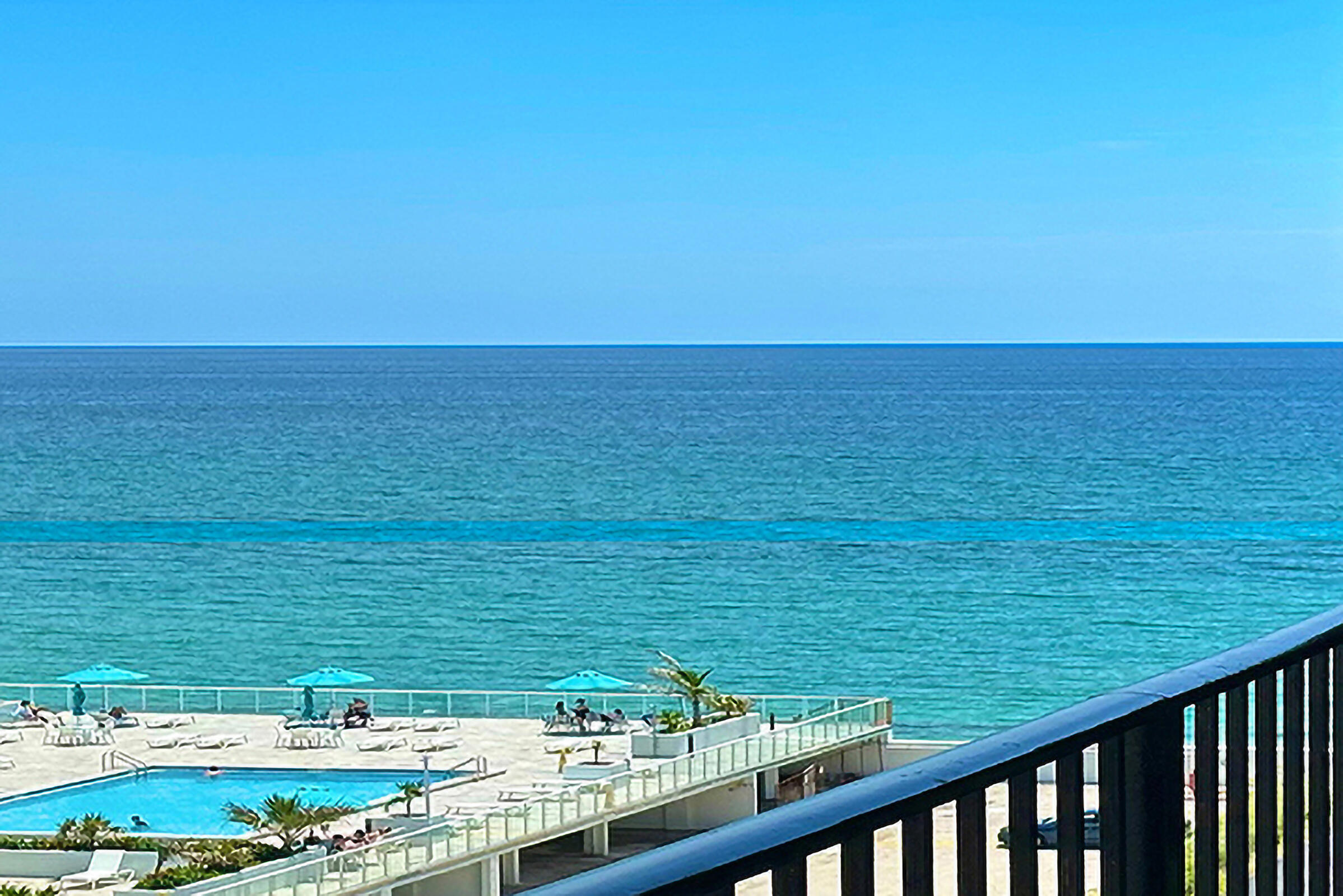 a view of an ocean from a balcony