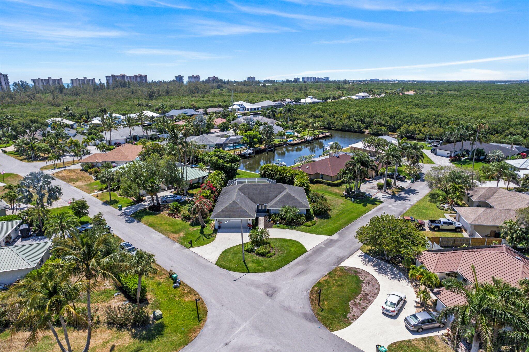 an aerial view of residential houses with outdoor space