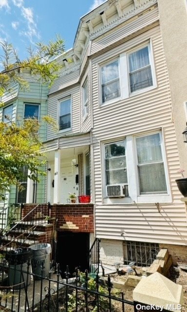 a front view of a house with parking