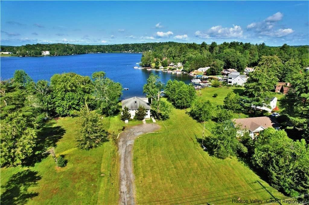 a view of a lake with a yard