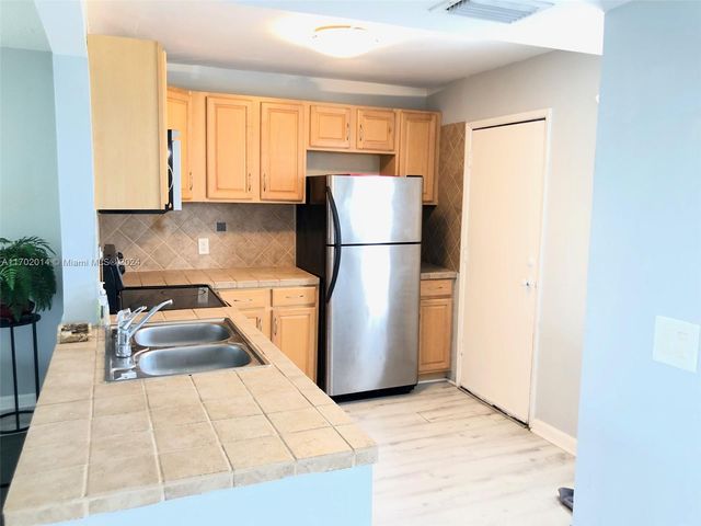 $179,000 | 18900 Northeast 14th Avenue, Unit D204 | Ojus