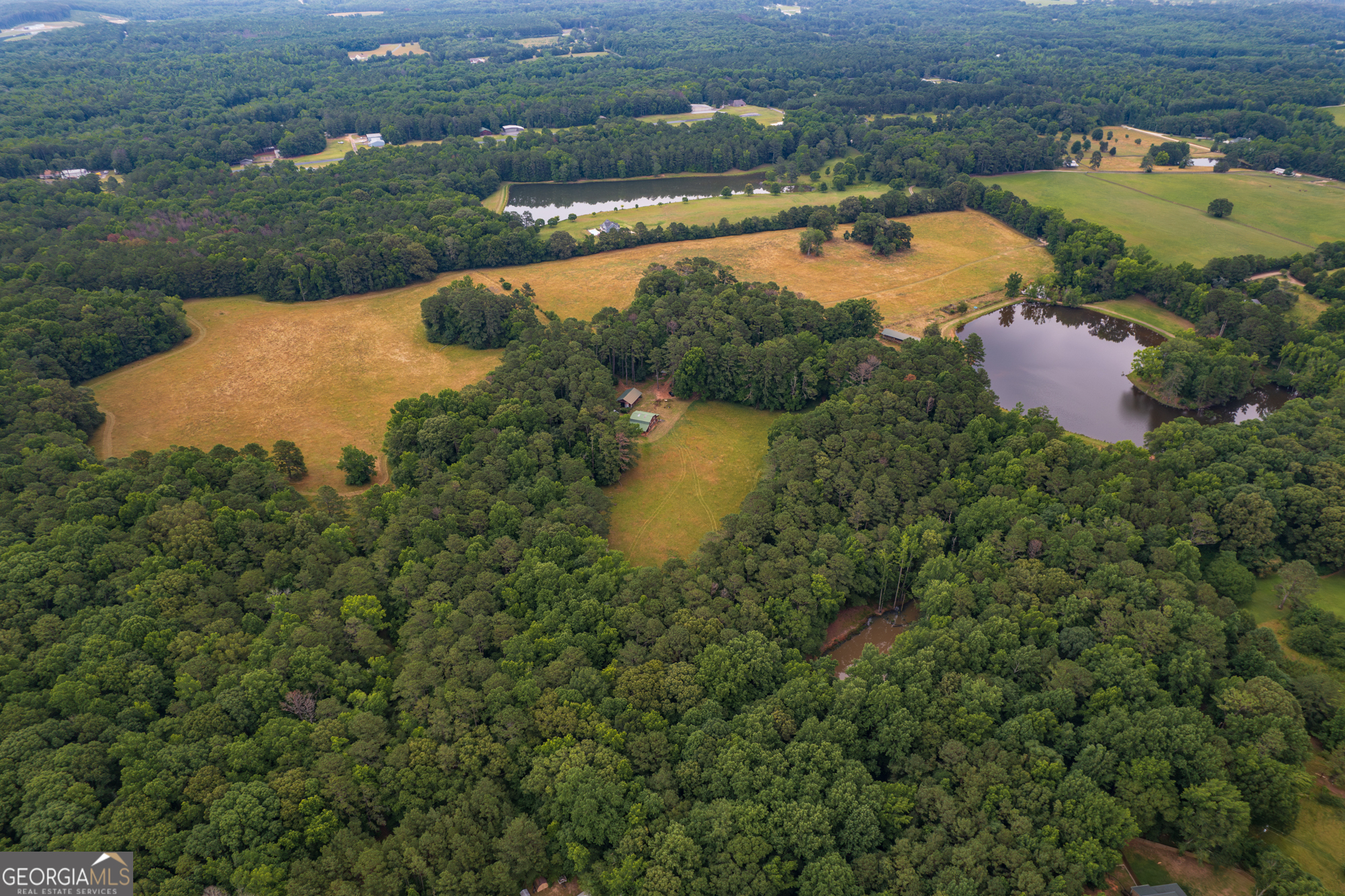 an aerial view of ocean residential house with outdoor space and river