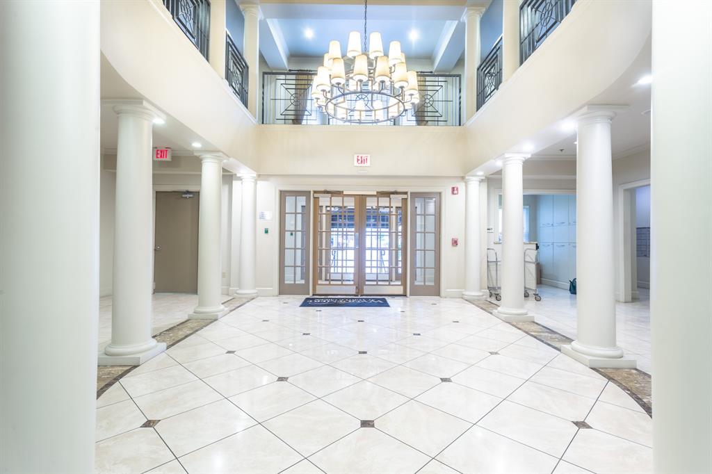 a view of an entryway with a chandelier