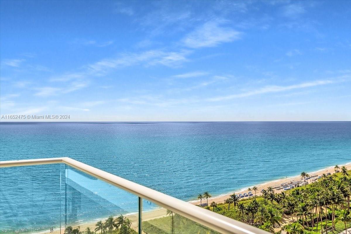 a view of an ocean from a balcony