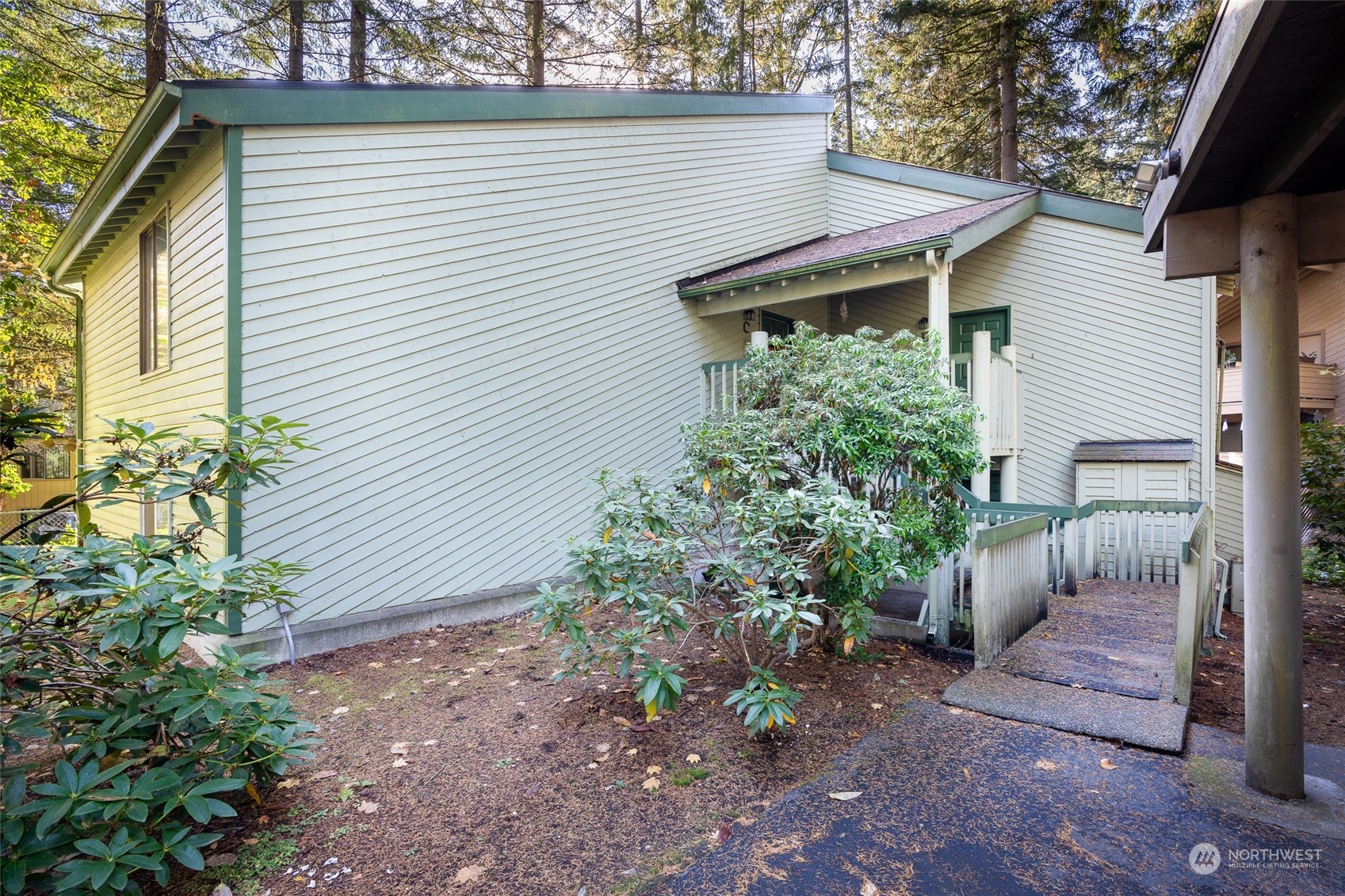 a backyard of a house with lots of green space