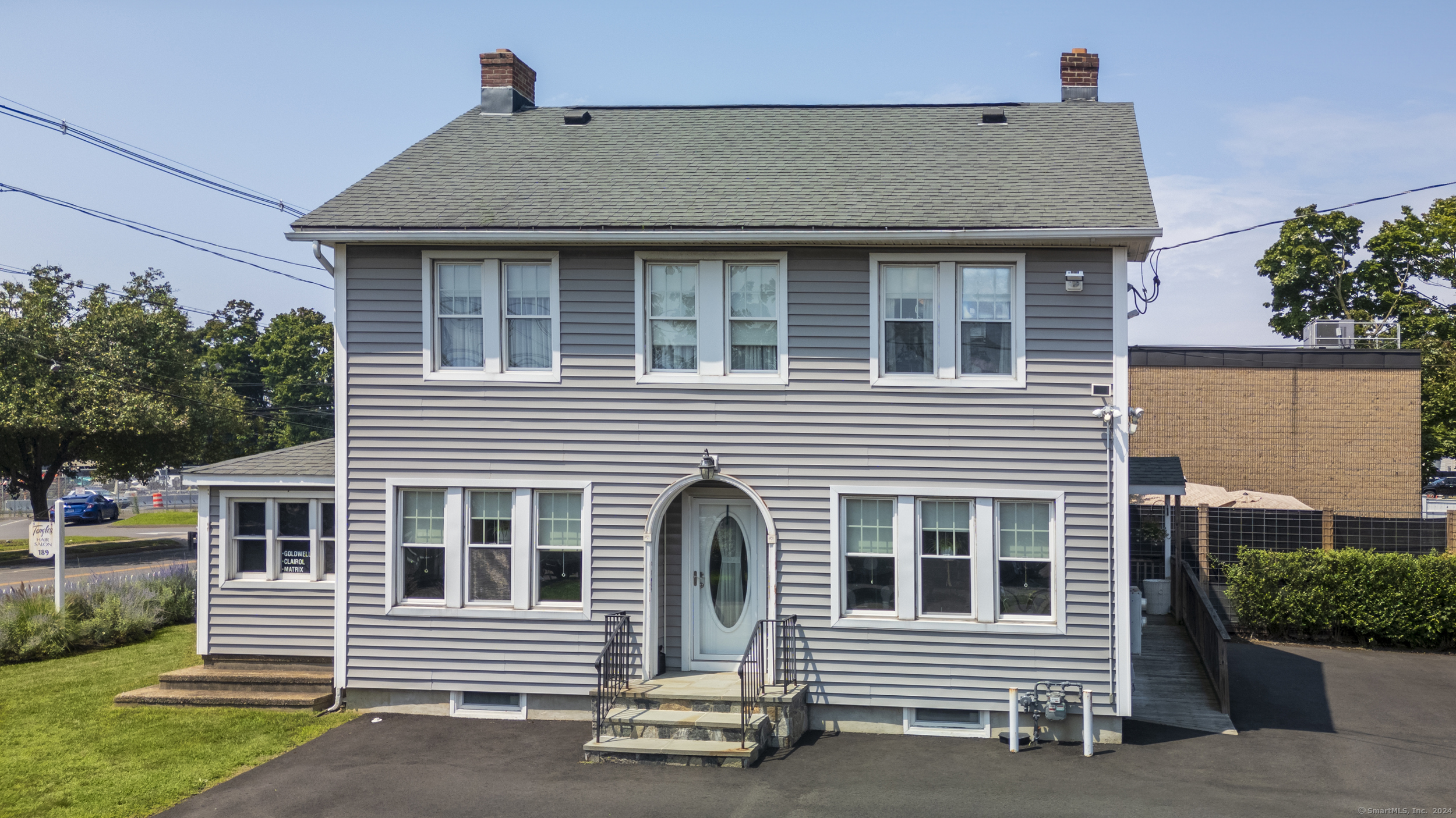 a front view of a house with a porch