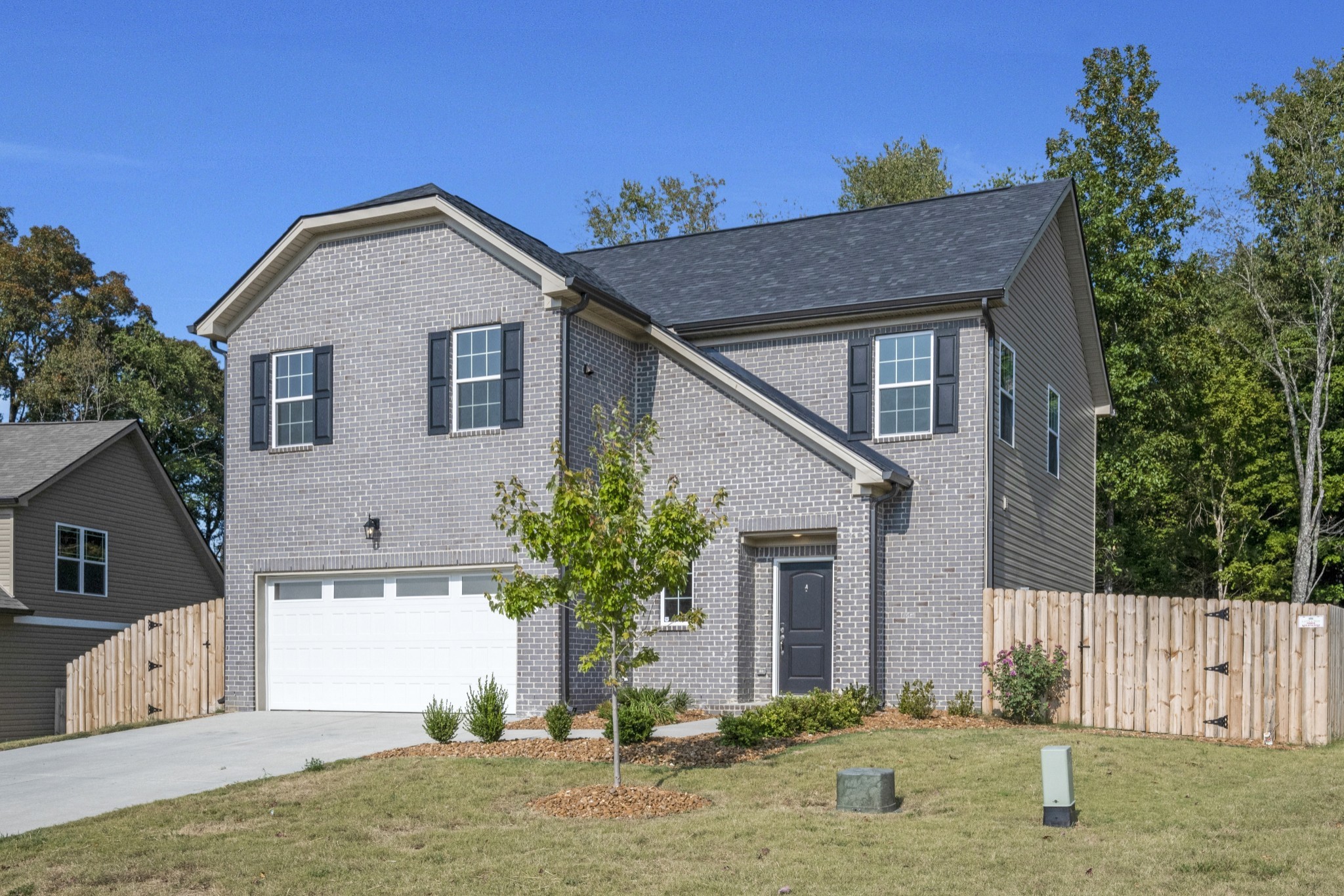 a front view of house with yard