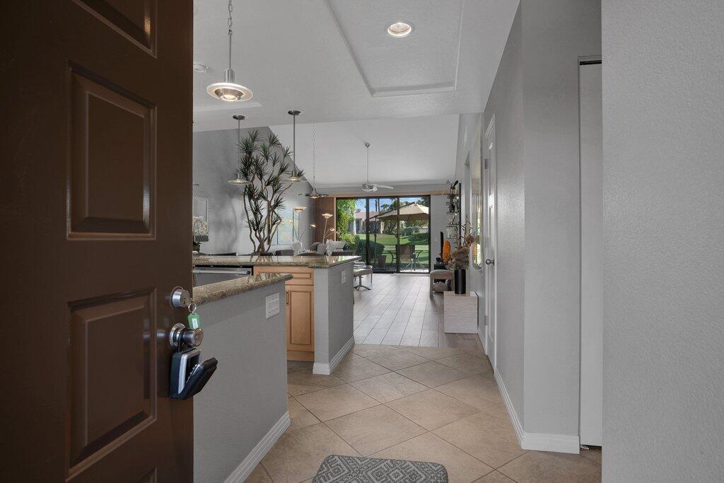 a kitchen with a sink and refrigerator