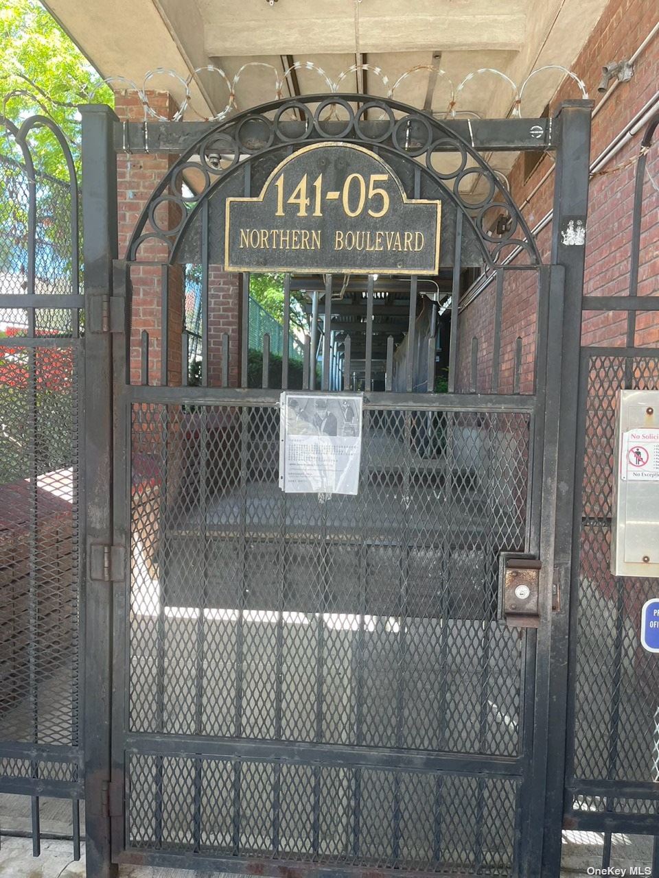 a view of a building with a sign on the wall