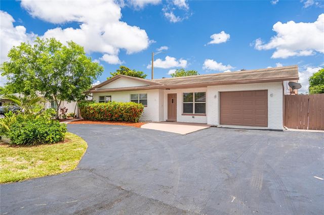 $705,000 | 3160 Northwest 63rd Street | Palm Aire Village West