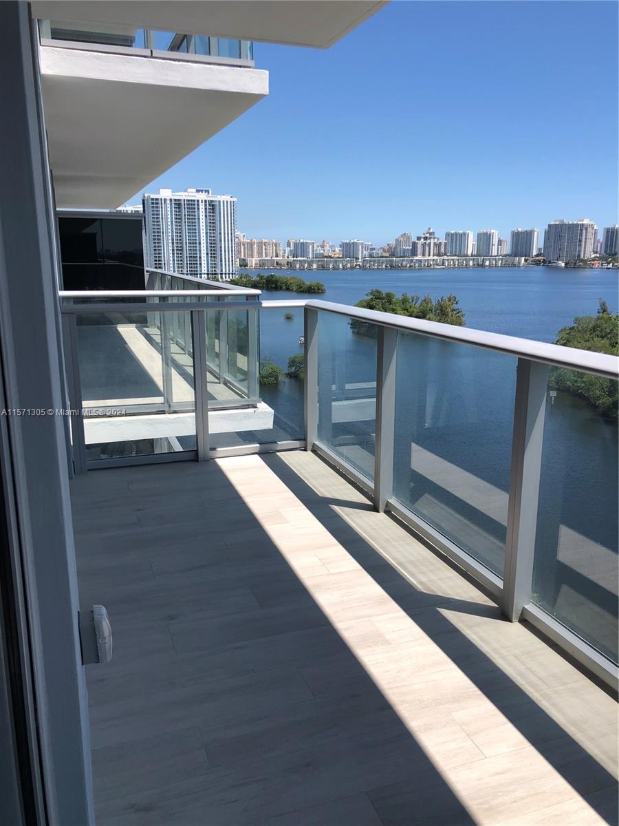 a view of a balcony with an outdoor space