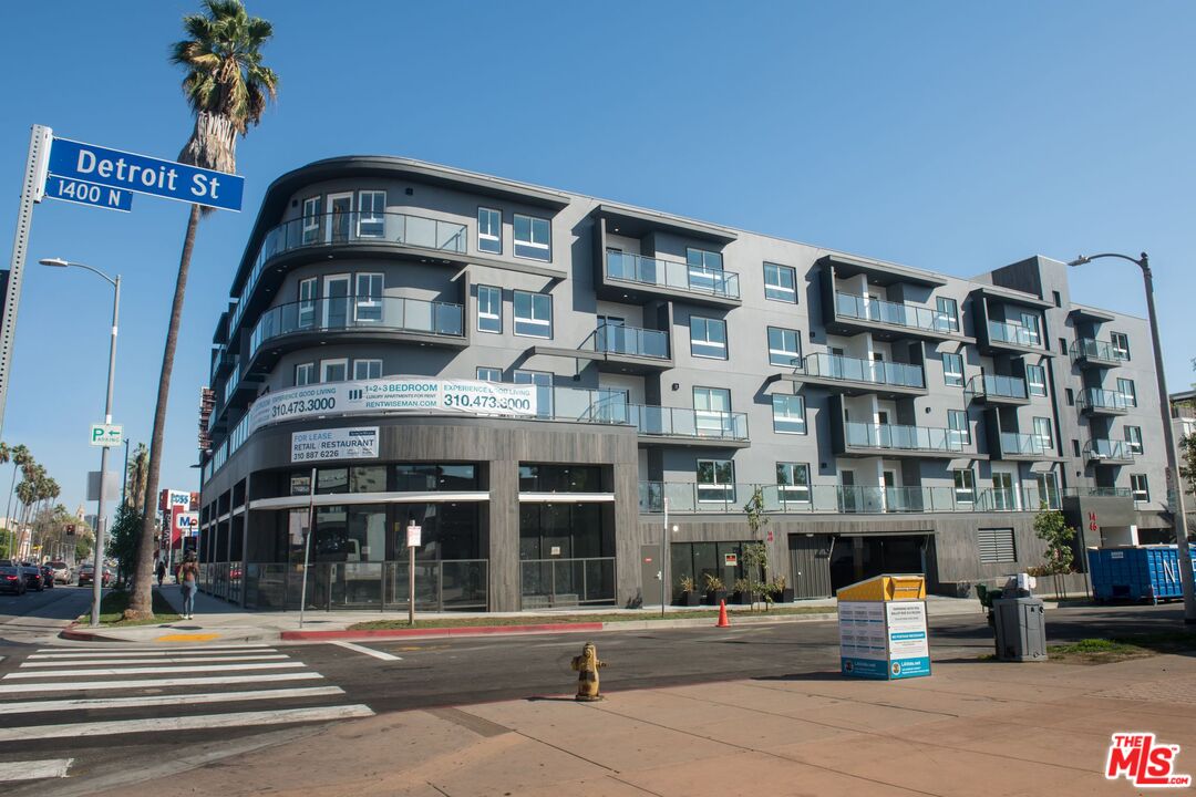 a front view of a building with street view