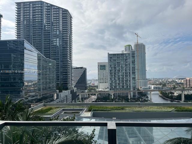 a view of a city with tall buildings