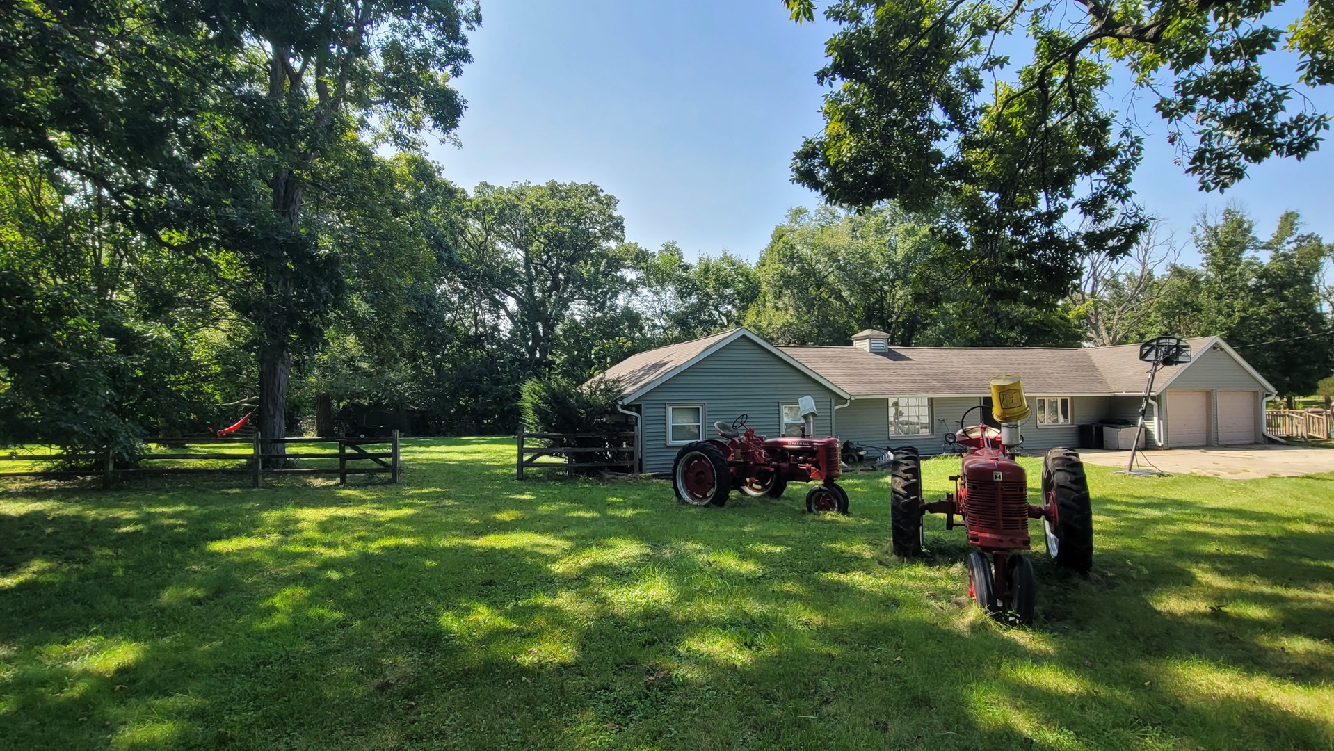 a view of a house with a yard porch and sitting area