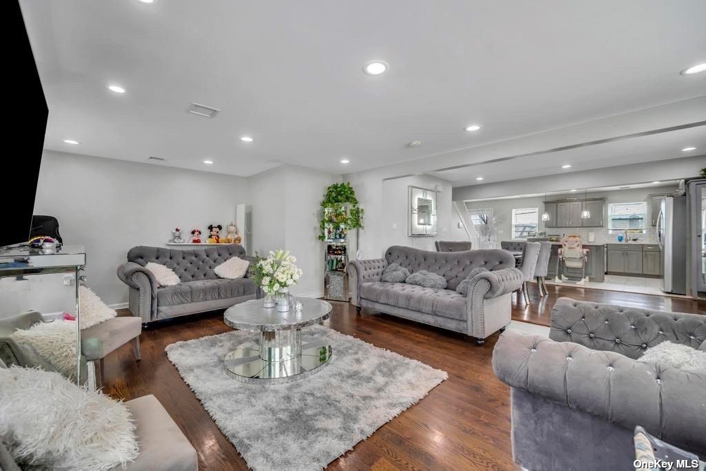 a living room with furniture and a couch