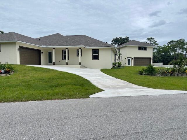 front view of a house with a yard