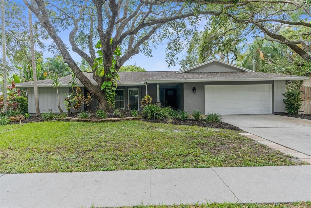 front view of a house with a yard