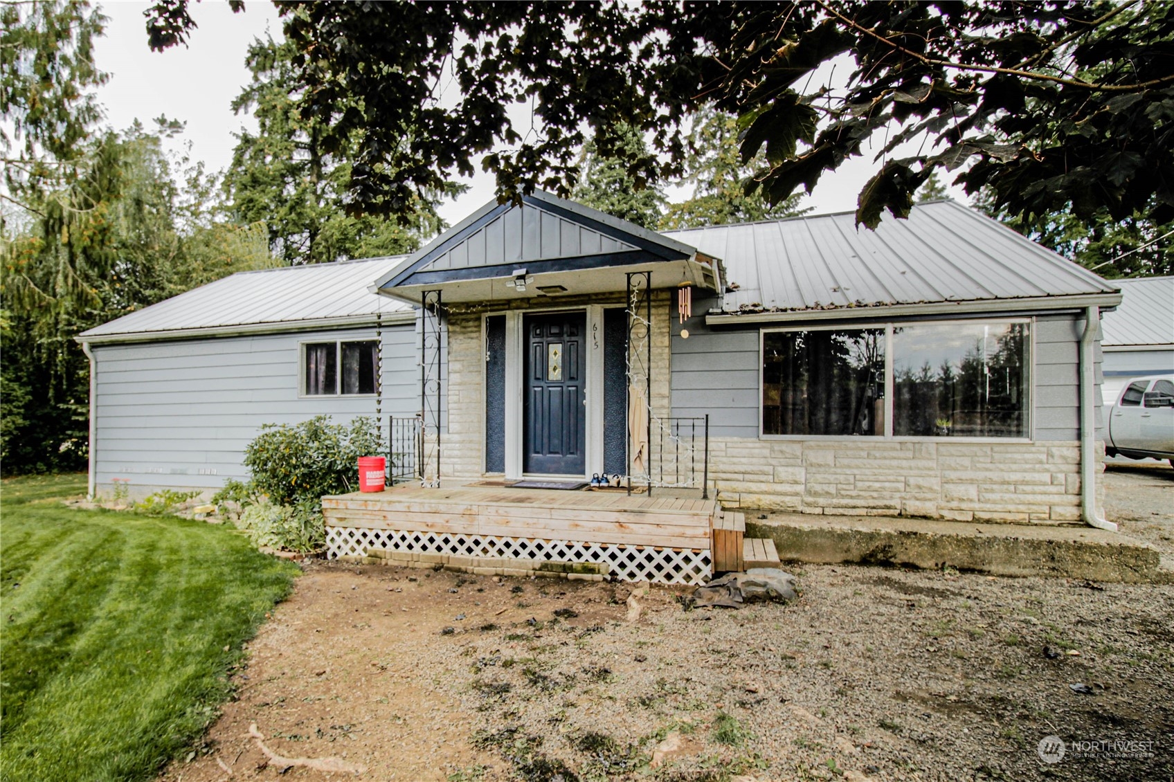 a front view of a house with a porch