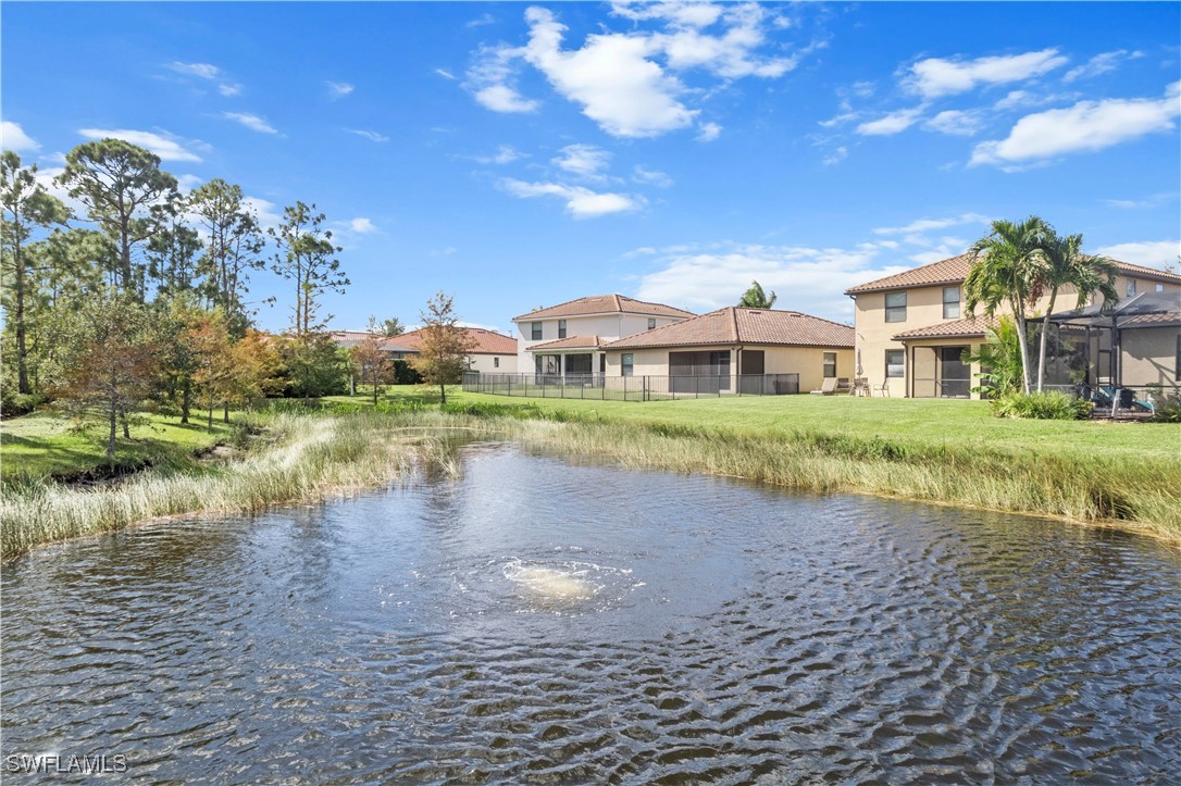 a view of a lake with a house